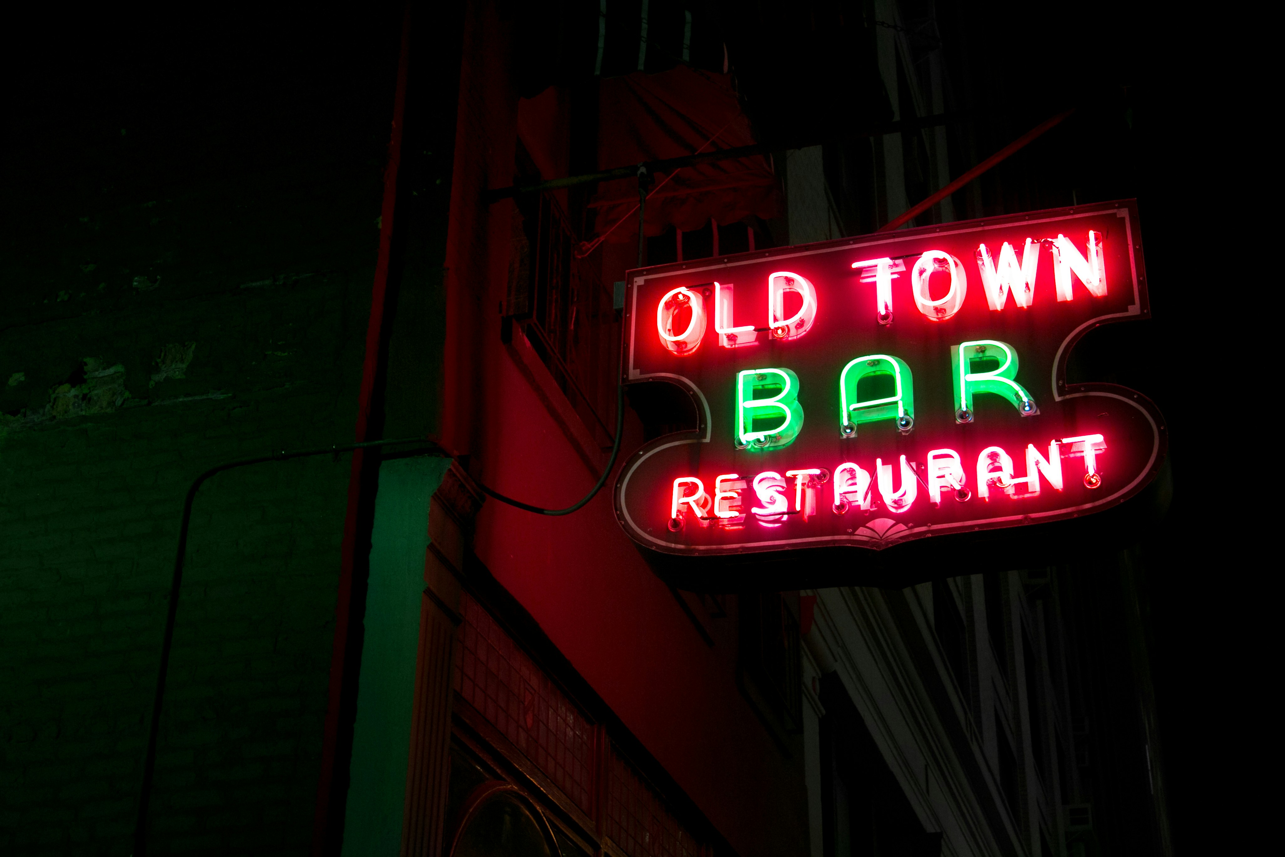 turned on Old Town Bar restaurant neon light signage